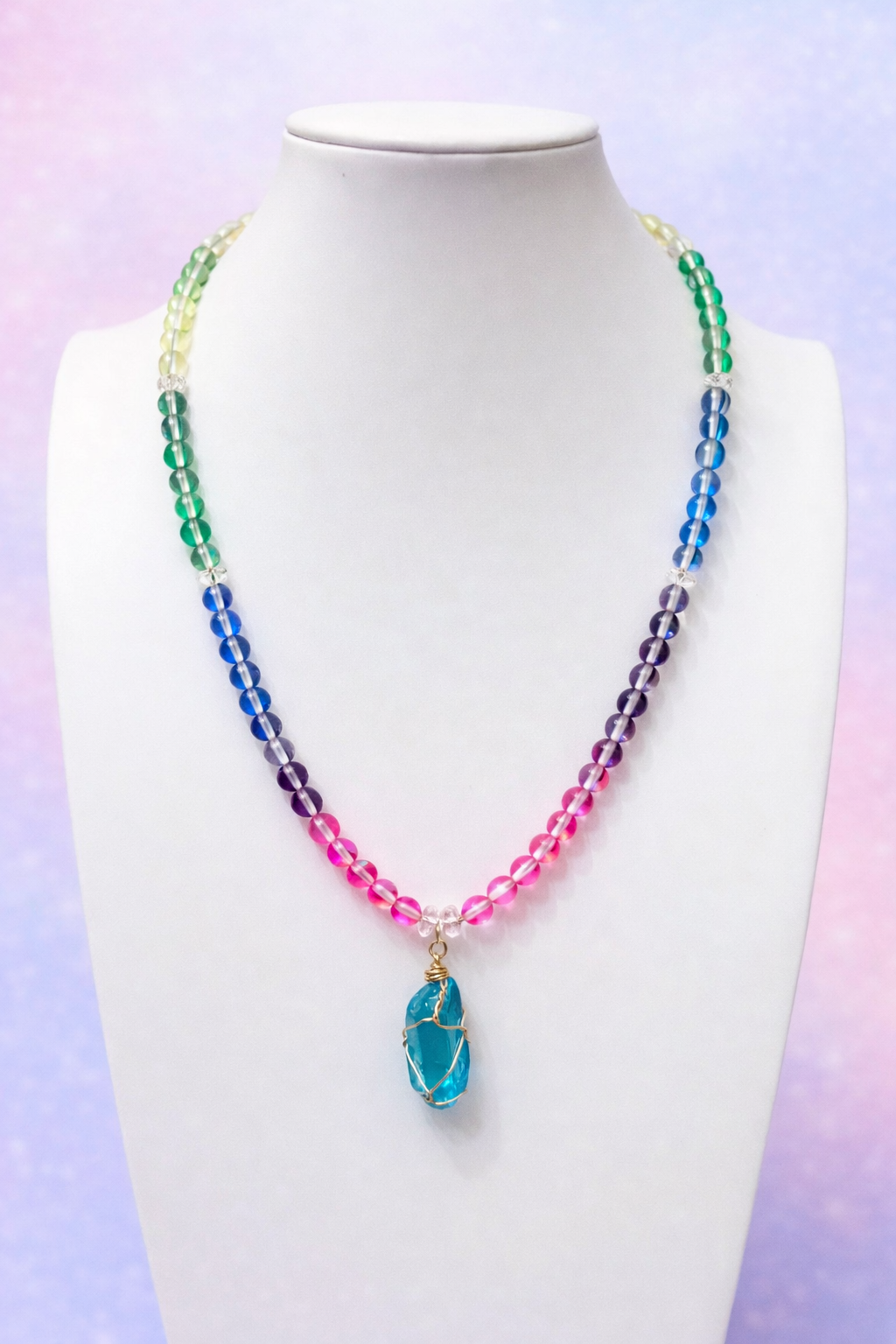 Aura quartz gemstone necklace with Aqua wrapped pendant
