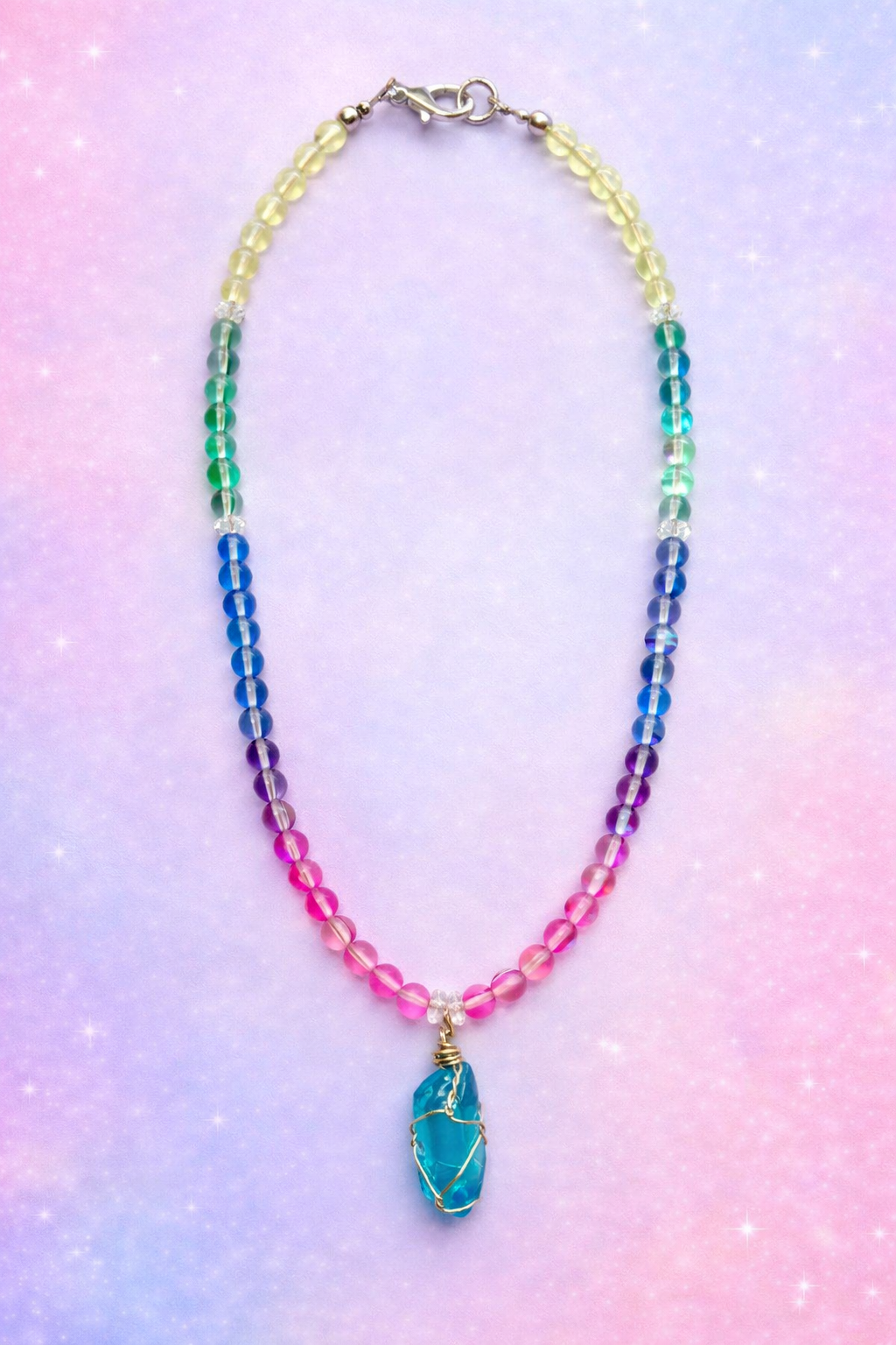 Aura quartz gemstone necklace with Aqua wrapped pendant